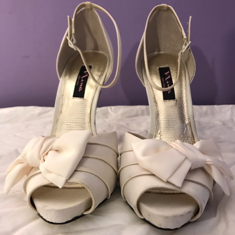 Nina size 9 M creamy white 5” satin heel sandals.  Big bow, ankle strap.
